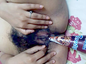 Indian girl Ketki assists her boyfriend in using a cone ice cream to penetrate her vagina