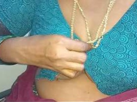 Tamil auntie flaunts her big boobs and pussy in solo video
