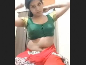 Big-bellied bhabhi strips and changes into a saree live