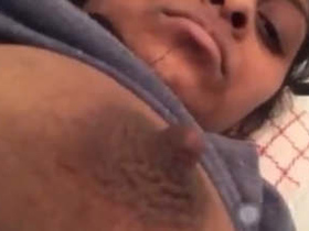 Desi girlfriend with large breasts on display