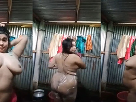 Indian village bhabhi in the bathtub - a seductive performance
