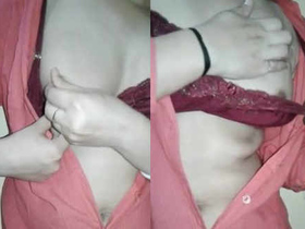 Indian wife enjoys herself by fondling her breasts