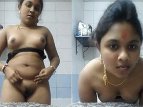 Indian wife seductively removes clothes in front of camera