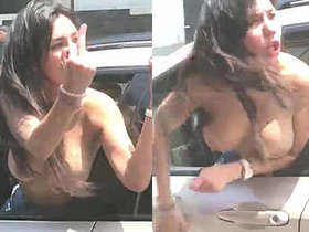 Desi slut goes topless and wild in public road