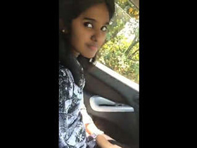 Cute college girl gives blowjob in a car