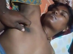 Husband fondles his wife's breasts while she sleeps