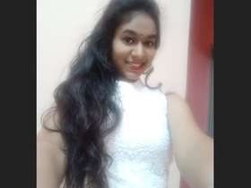 Indian babe flaunts her stunning figure while dressing up for her boyfriend