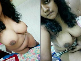 Desi girl shows off her boobs while fingering herself